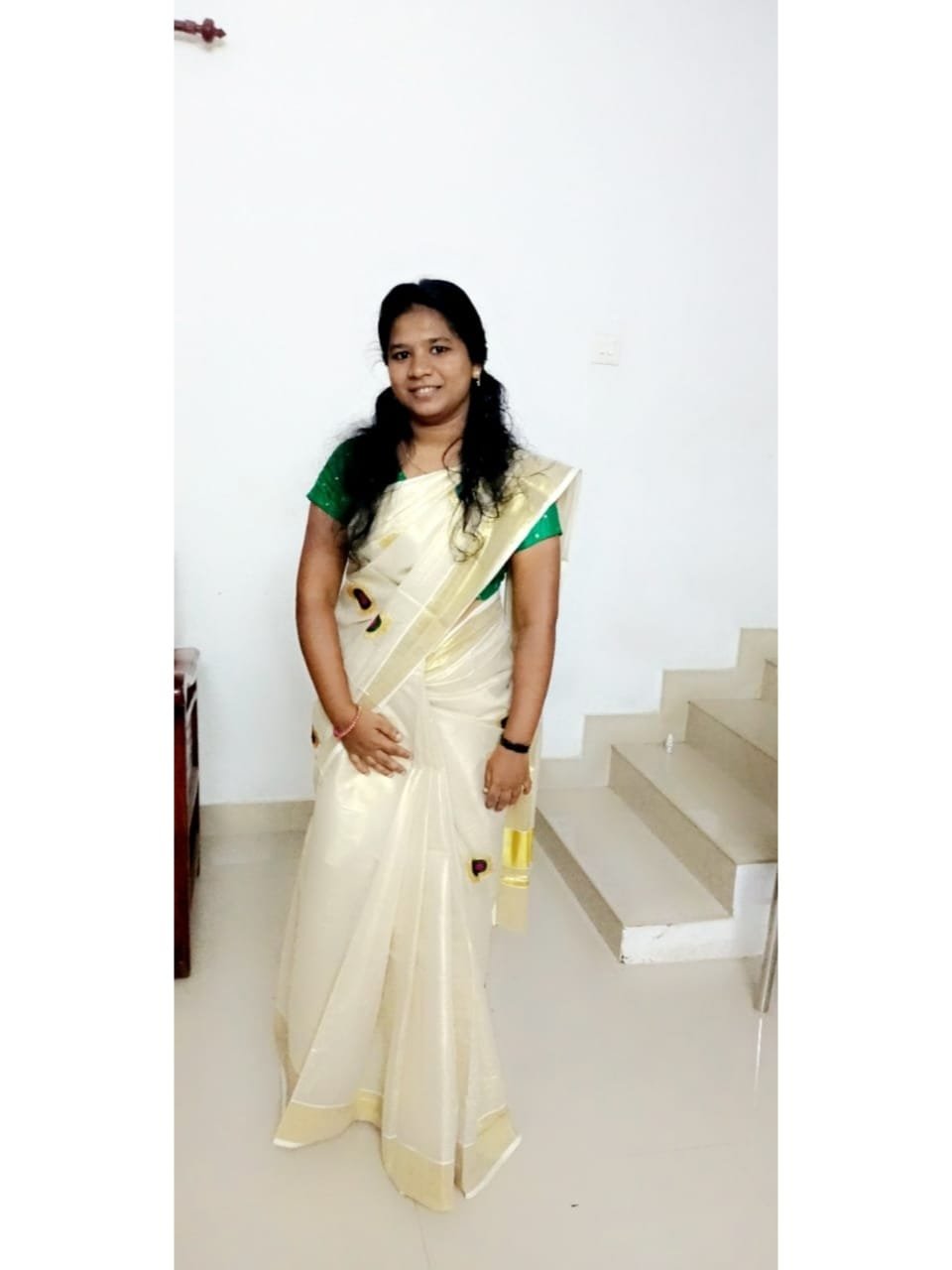 POOJA J